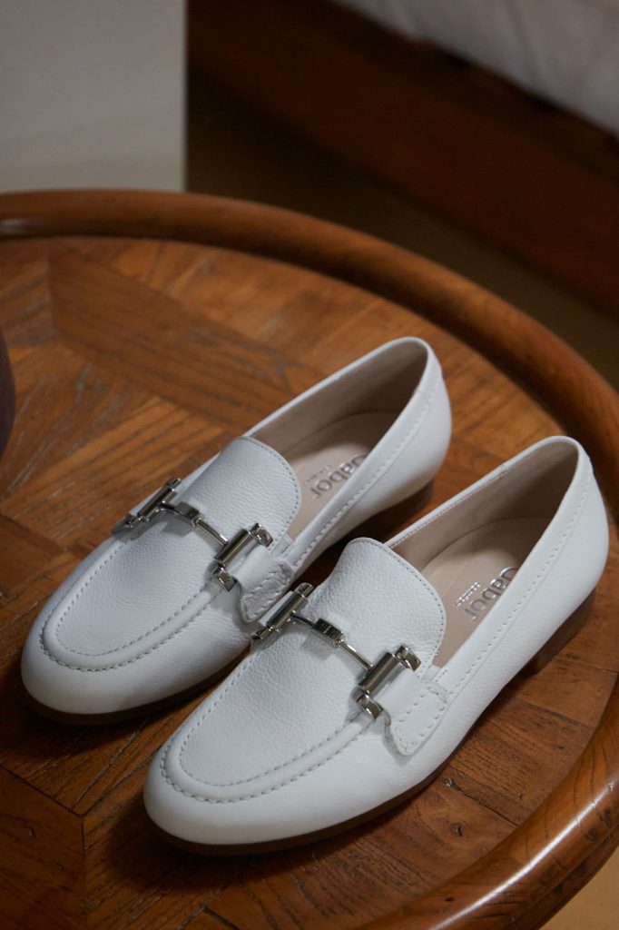 White loafers on a table