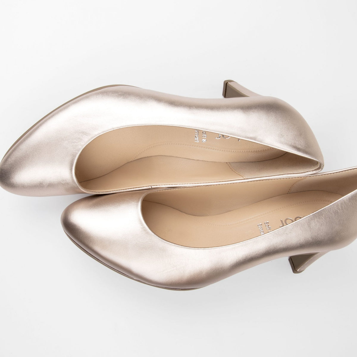 Edina heels in silver are sat against a white background.